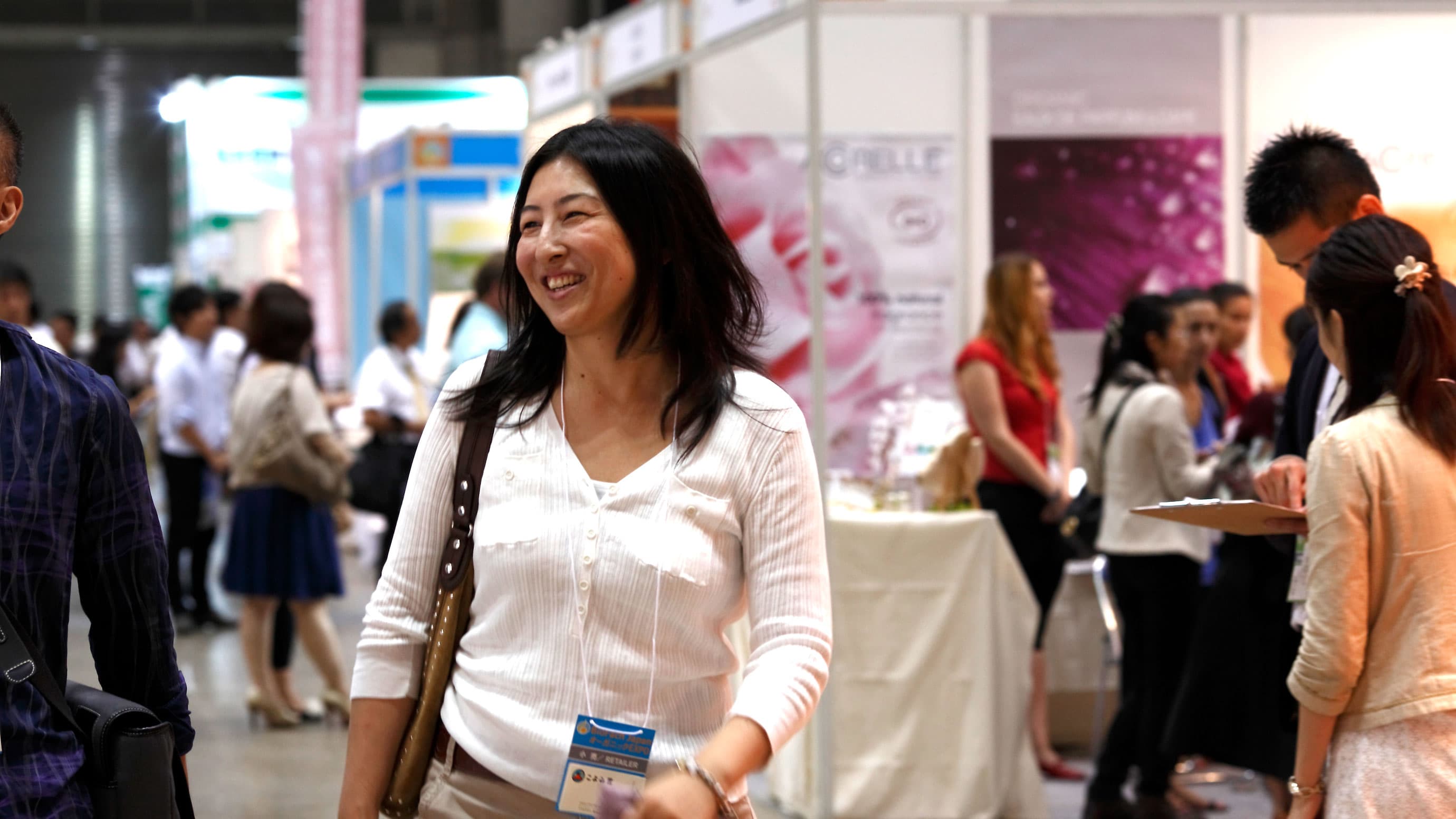 Visitor smiling in the hallway